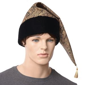 Black and gold pointed hat for witches